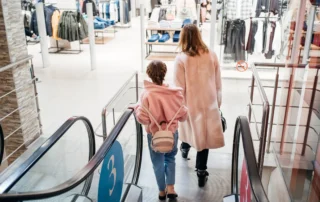 mom-and-daughter-on-escalator-